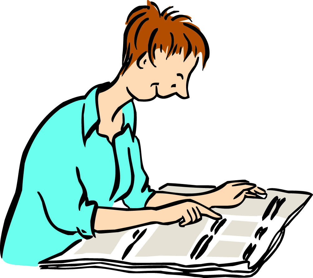 Eine Frau liest in einer Zeitung.