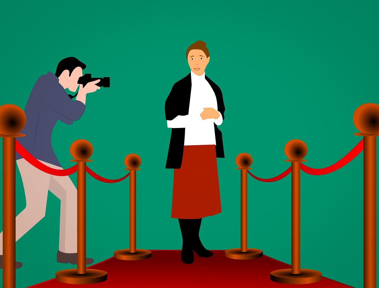 Vorbilder Eine Frau steht auf dem roten Teppich. Sie wird fotografiert.